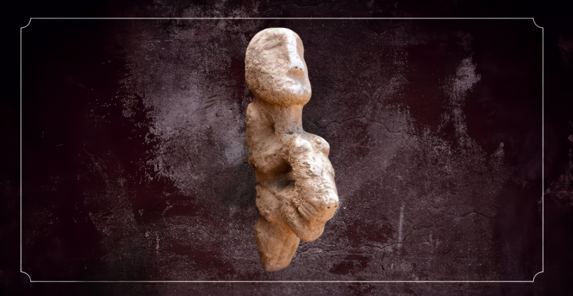 Stone sculpture depicting a human figure seated on the back of a leopard