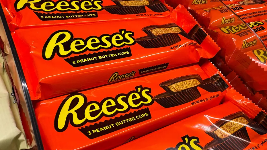 Packages of Reese's peanut butter cups displayed at a retail store