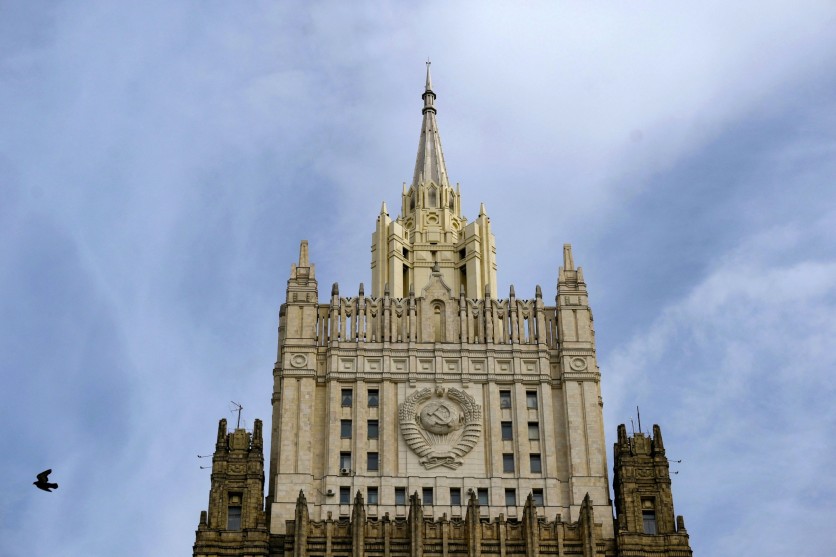 bird flies past Russian Foreign Ministry headquarters