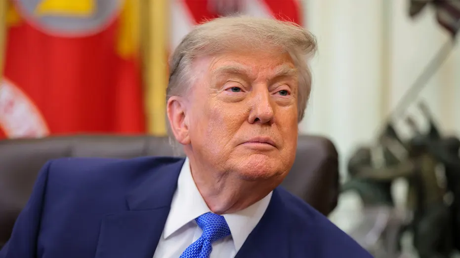 President Donald Trump takes questions from reporters in the Oval Office at the White House