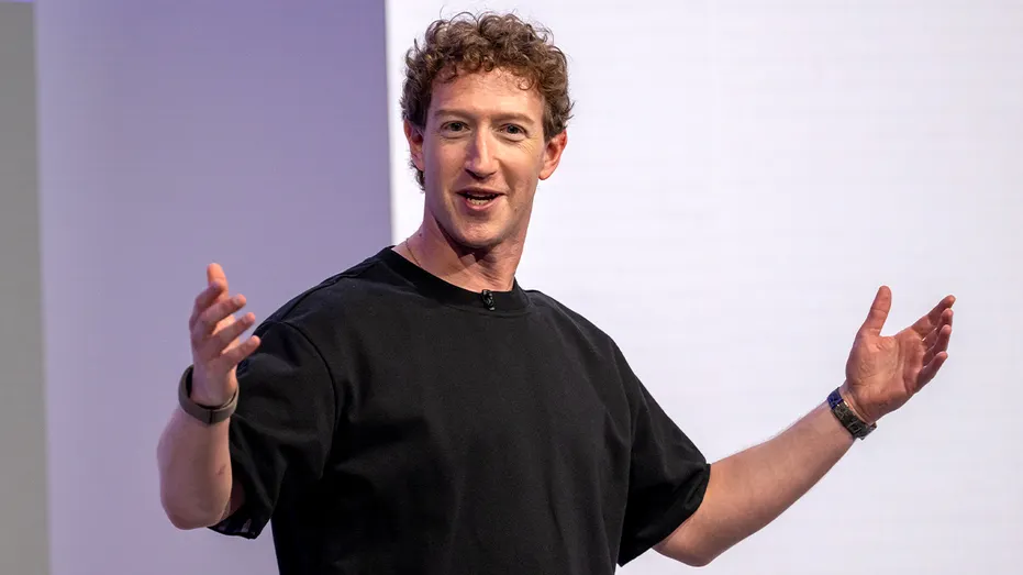 Meta CEO Mark Zuckerberg stands on stage presenting new hardware during a company event.