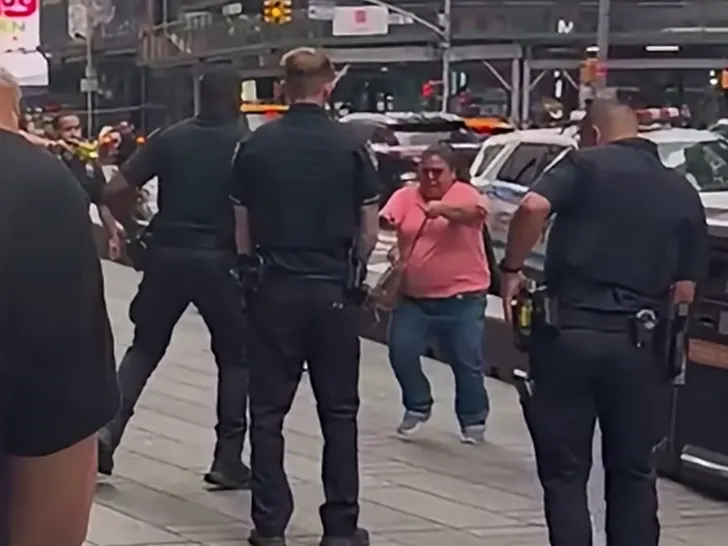 A woman reportedly confronted NYPD officers while holding two knives, shortly after she allegedly stabbed multiple people, according to police reports. The scene remains active