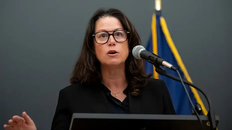 Jennifer Davenport, New Jersey attorney general, speaks at a news conference.