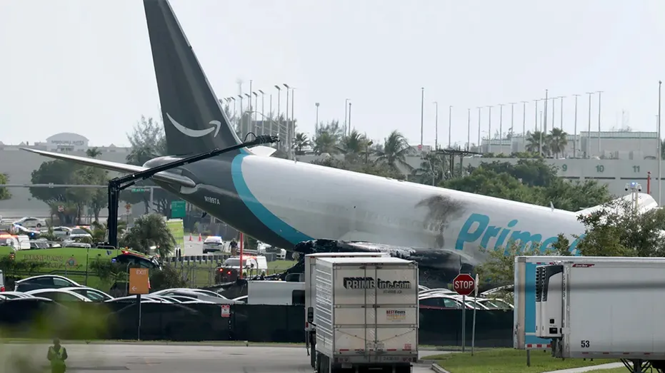 An Amazon cargo plane is seen crashed