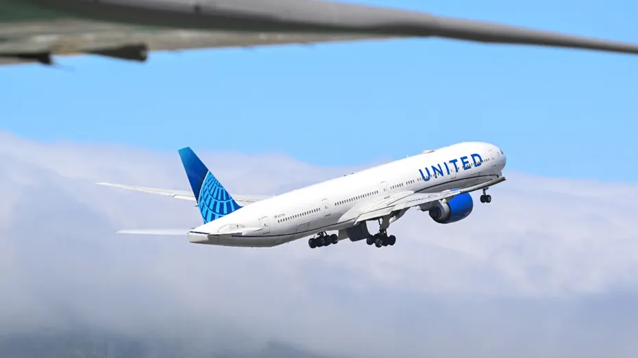 A United Airlines plane takes off at