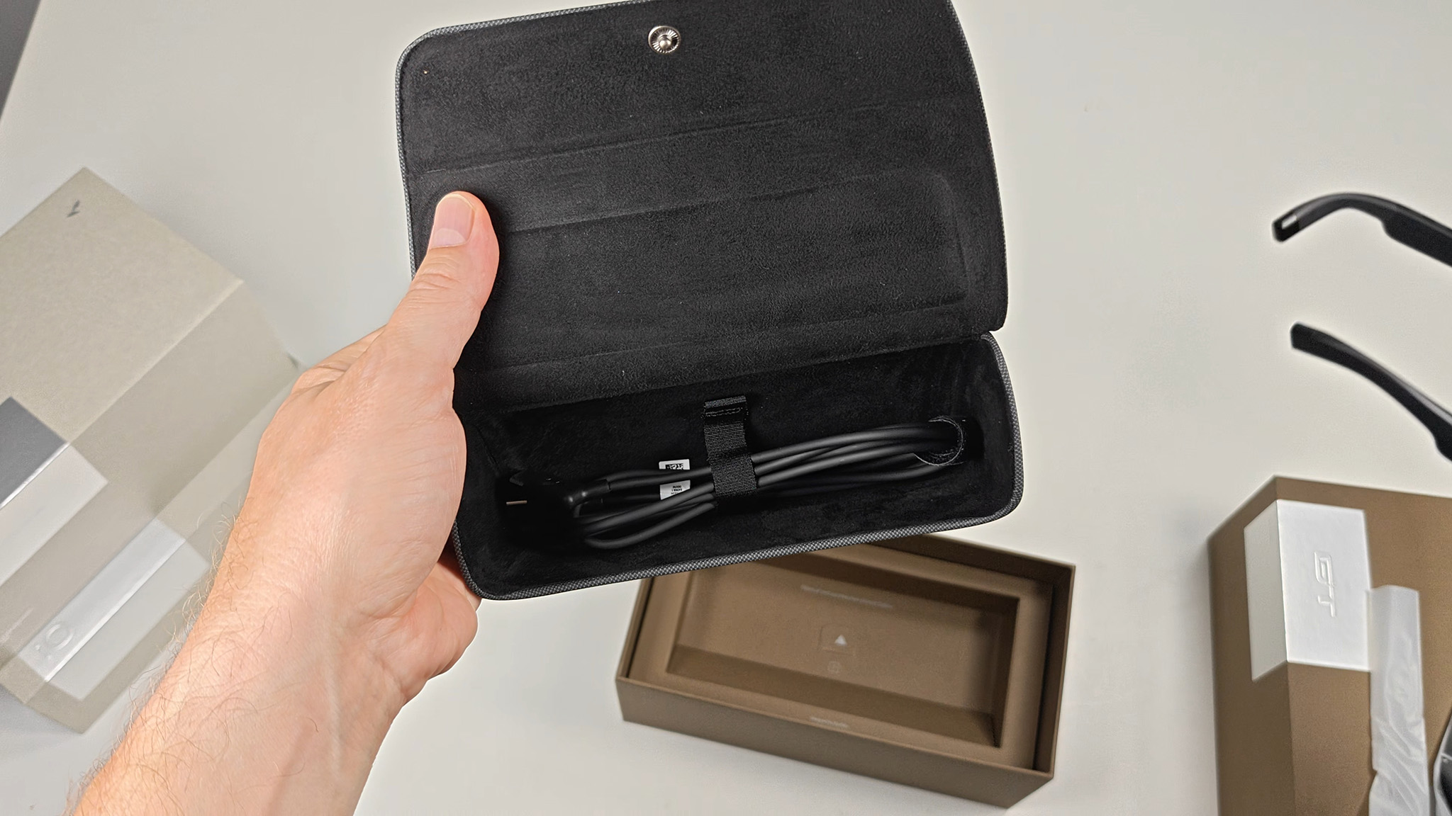 RayNeo GT smart glasses included fabric case