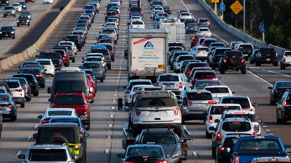 Cars are seen in traffic in California