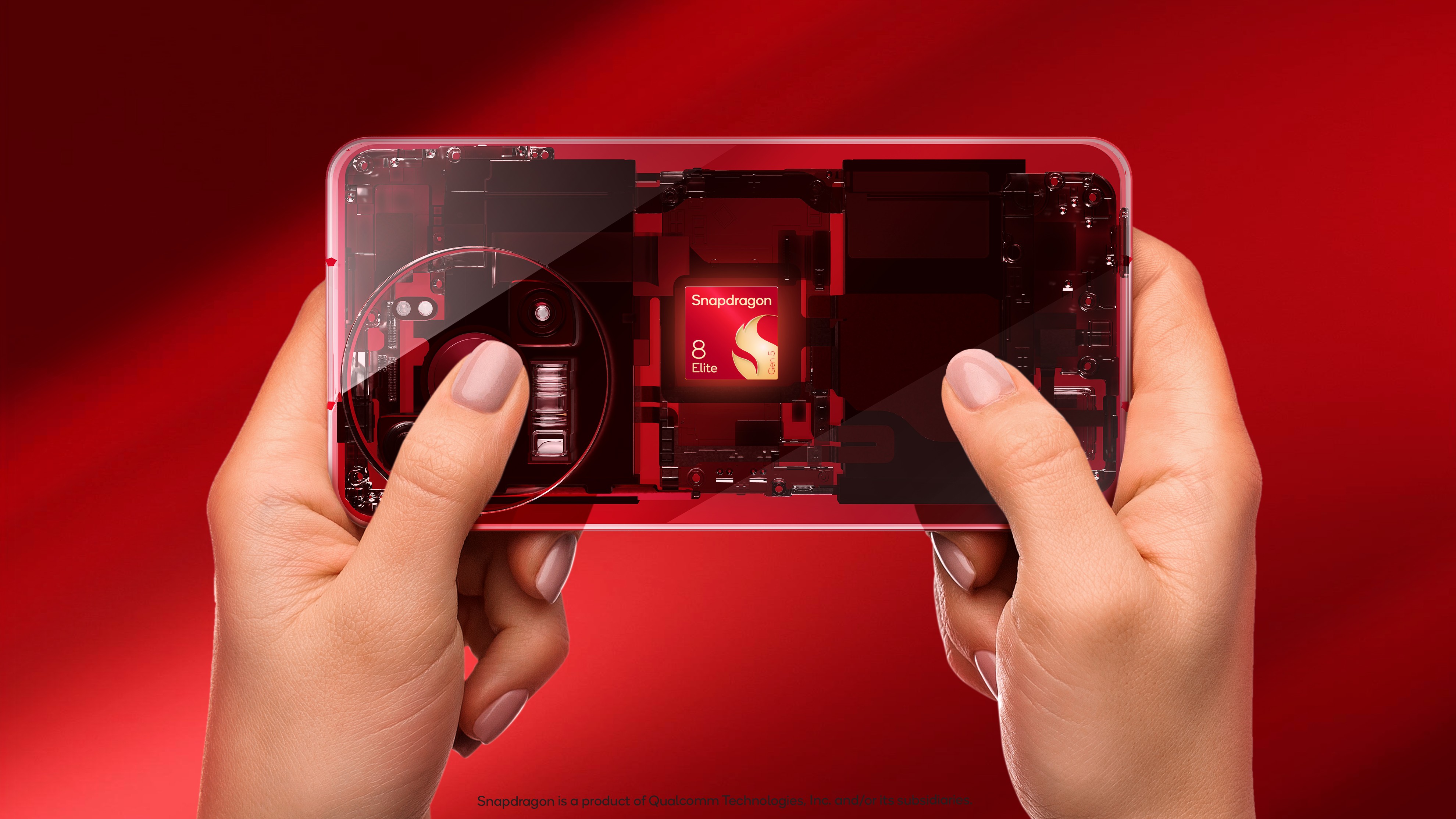 Hands holding a transparent device with the Snapdragon 8 Elite Gen 5 showing