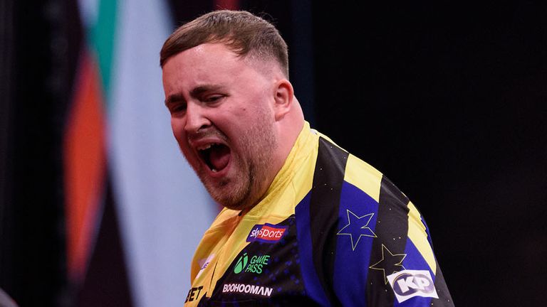 Littler celebrates during his victory over Aspinall (credit: Kelly Deckers/PDC)