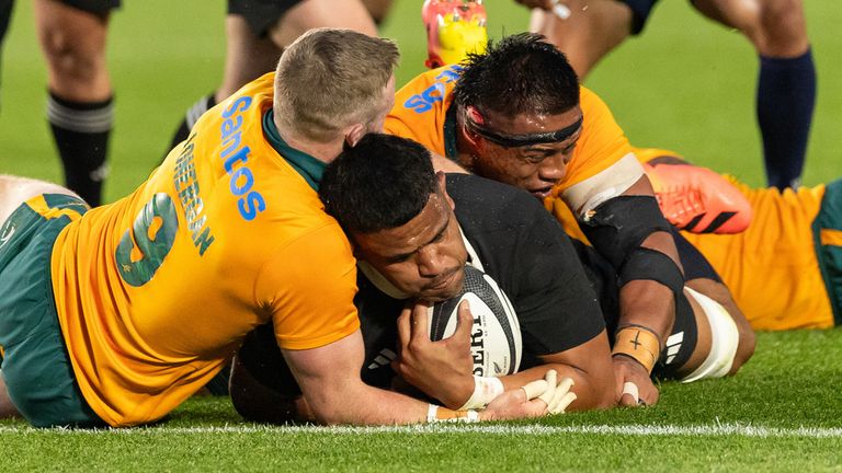 New Zealand's Tupou Vaa'i forced his way for their second try and the lead