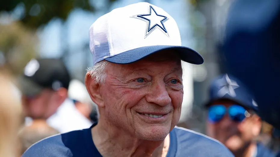 Jerry Jones looks on