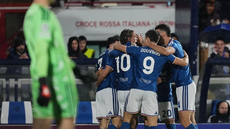 Como players celebrate taking an early lead against Man Utd in the Champions League