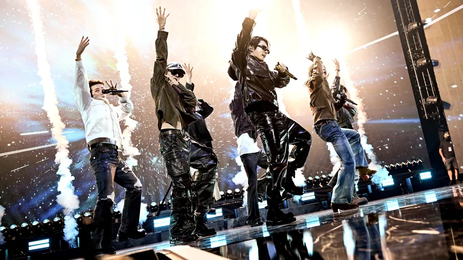 BTS members on stage.