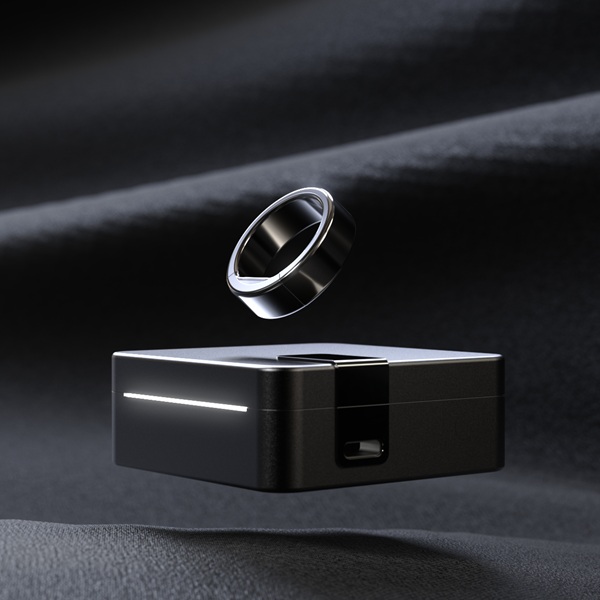 Ultrahuman Ring PRO in Aster Black with its charging case.