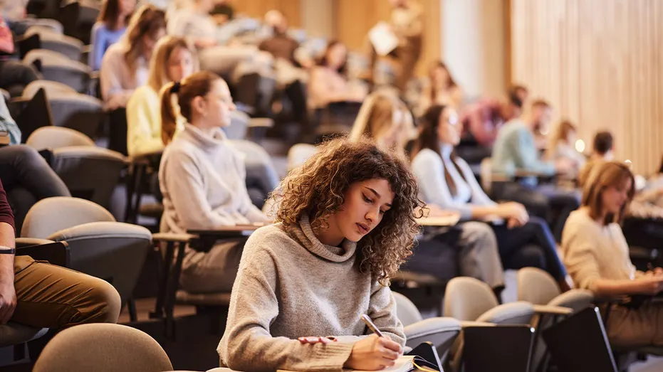 Students in a college lecture hall