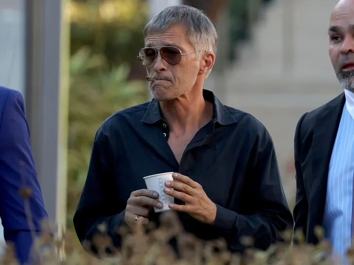 olivier martinez smoking after court backgrid 2
