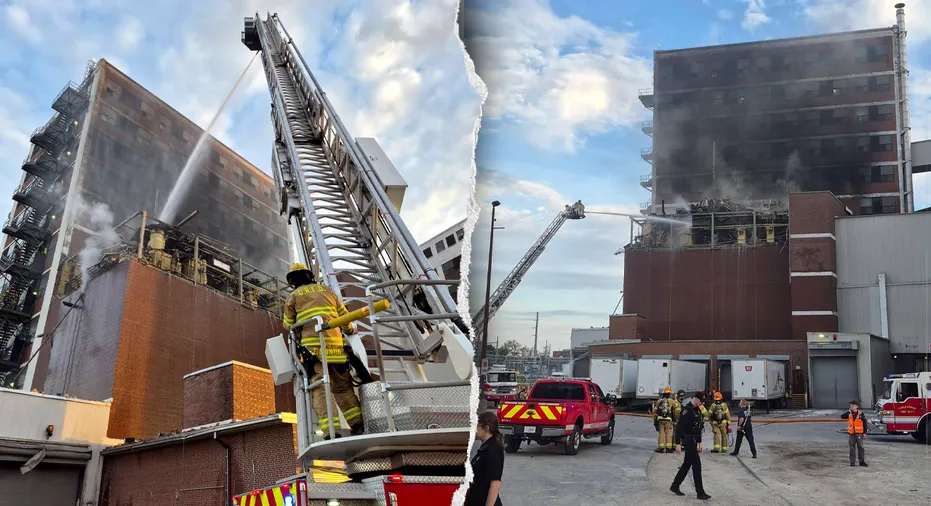 Firefighters work to extinguish a fire at the plant