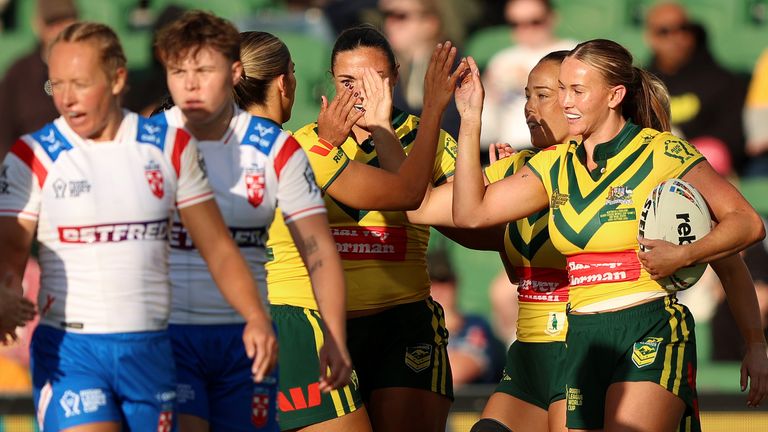 Australia winger Jaime Chapman celebrates scoring an try against England