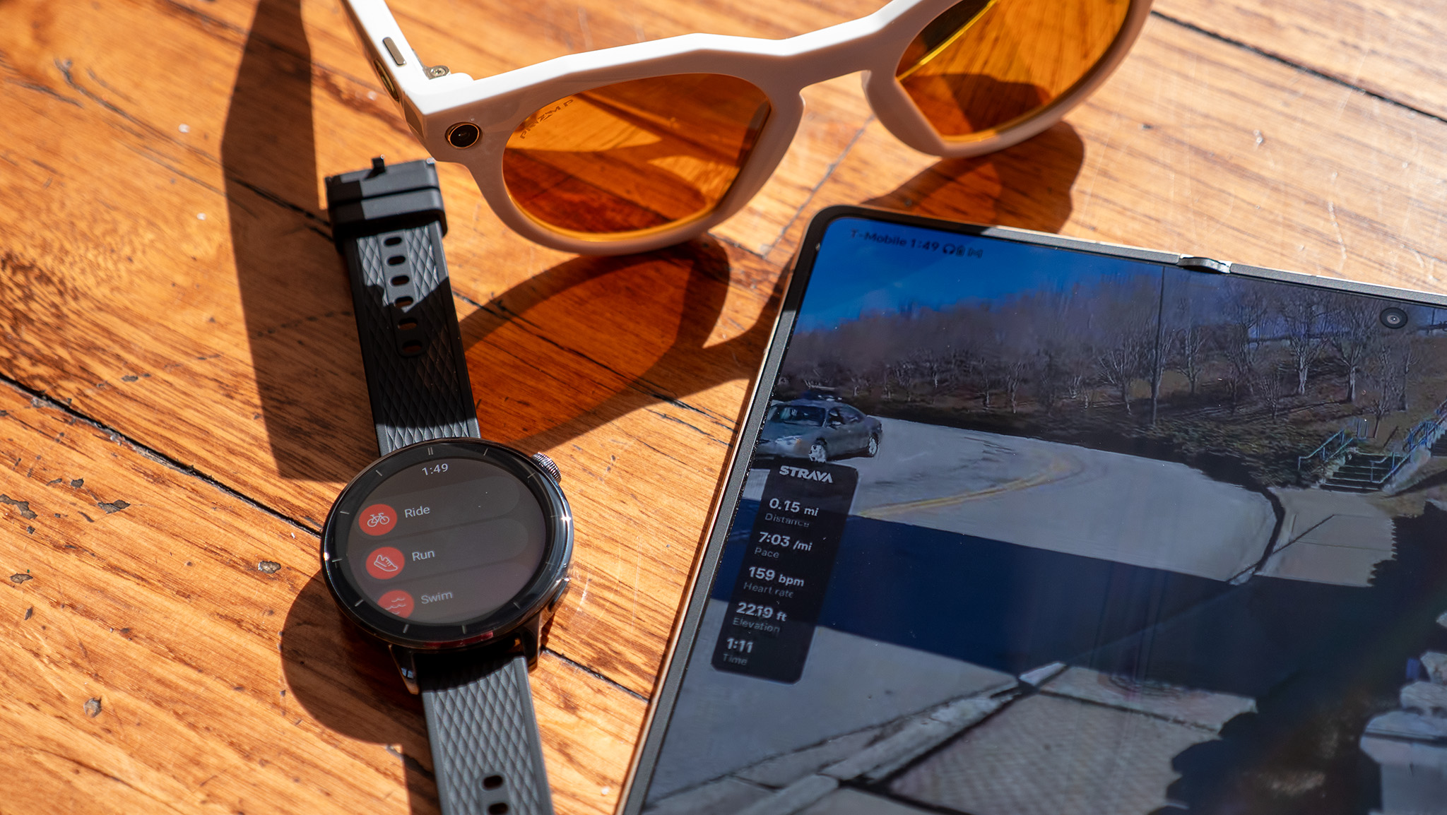 Using the Strava app on a OnePlus Watch 3 43mm and a pair of Oakley Meta HSTN smart glasses to add workout stats to recorded video