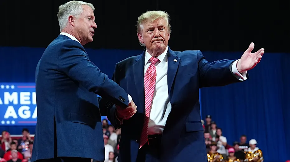 Sen. Roger Marshall and President Donald Trump on stage at a Monday night midterm rally